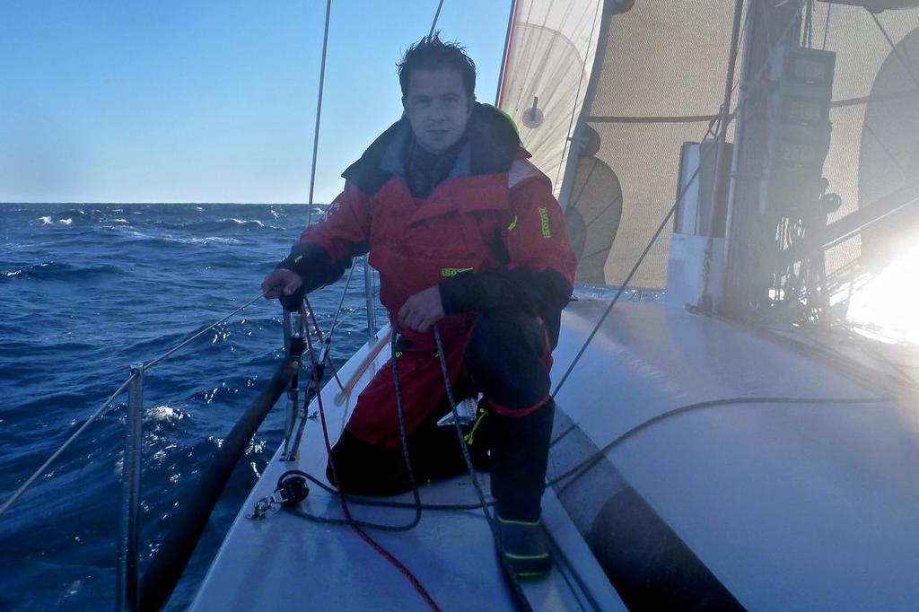 Ben Gladwell in the full Zhik Ocean Kit aboard Pretty Fly III in the early morning of the Sydney Goldcoast race © SW